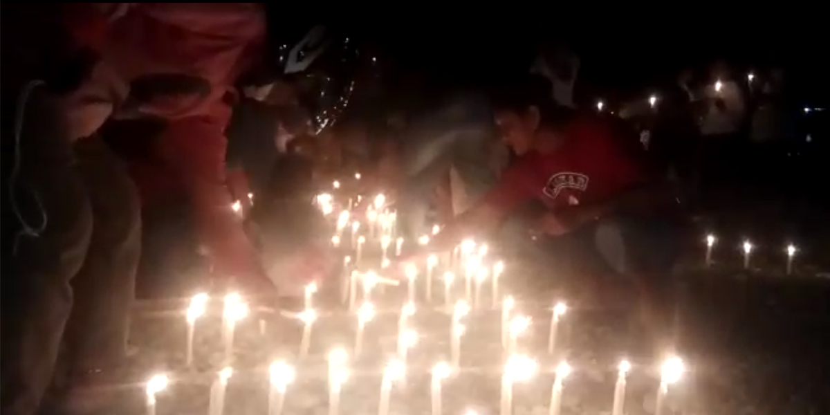 merefleksi-setahun-banjir-bandang-sentani-warga-timika-nyalakan-1000-lilin